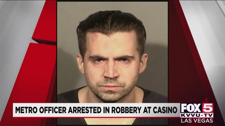 Las Vegas police officer arrested in casino robbery investigation