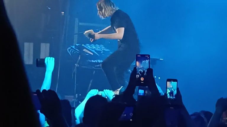 Porter Robinson eating a Tayto crisp sandwich onstage at Nurture Live, The Academy, Dublin