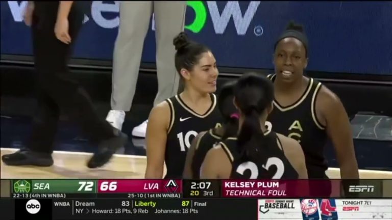 Kelsey Plum picks up a technical for slapping ball